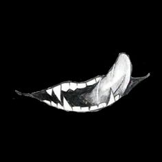 an animal's teeth are shown in the dark