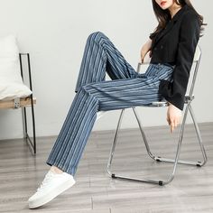 Unleash Your Style with Every Step Discover the perfect blend of retro charm and modern fashion with our High-Waist Striped Wide-Leg Jeans. Designed for women who appreciate both style and comfort, these jeans feature a striking striped pattern that sets you apart from the crowd. Whether you're stepping out for a casual coffee date or gearing up for a day in the city, these pants promise versatility and a trendy look for every season. Product Features Our wide-leg jeans are crafted from a high-quality mix of cotton and viscose, ensuring breathability and comfort. The slight stretch in the fabric accommodates your every move, making them ideal for all-day wear. With a loose fit and a high-rise design, they accentuate your waist and elongate your legs, providing a flattering silhouette for a Retro Ankle-length Pants For Spring, Chic Non-stretch Denim Bottoms, Elegant Denim Blue Bottoms For Spring, Chic Denim Blue Straight Pants, Non-stretch Ankle-length Blue Jeans, Trendy Blue Ankle-length Pants, Trendy Ankle-length Blue Pants, Chic High Waist Denim Blue Pants, Elegant High-waist Blue Jeans