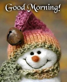 a snowman wearing a knitted hat and scarf with the words good morning on it