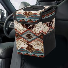 a car seat with a bag on the back in it's center console area