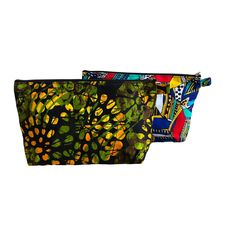 Handmade Accessory Pouch that comes in two different patterns. This African Print bag can be used  for keeping small items stored safely together. Makes a great makeup bag, cosmetics bag , toiletry bag , pencil bag or anything else that you like to use for. Made using Cotton African print fabric ,fully lined inside and closes using a zipper.     Measures appropriately  12 inches x 7 inches x 3 inches  Hand wash or machine wash cold and air dry. Unique gift to your loved ones or yourself Multicolor Rectangular Pouch With Pen Holders, Portable Multicolor Pouch Cosmetic Bag, Multicolor Portable Travel Cosmetic Bag, Multicolor Portable Cosmetic Bag For Travel, Portable Multicolor Travel Cosmetic Bag, Multicolor Rectangular Cosmetic Bag For Travel, Multicolor Rectangular Travel Cosmetic Bag, Multicolor Pouch Pencil Case For Daily Use, Portable Multicolor Pouch For Everyday Use