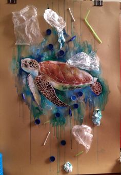 a painting of a sea turtle surrounded by plastic bags and other things on the wall