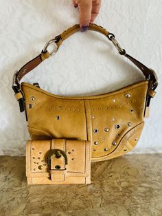 Vtg Coach Purse Shoulder Handbag soho bag 100% authentic , very good  condition  Color: Mustard  Made of vachetta, studs, rinestone  Silver tone Hardware Hangtag included Zip top closure detachable shoulder strap fabric interior Very clean interior / exterior 7-10"L x 6"H x 1.5"D PLEASE ASK QUESTIONS BEFORE CHECKOUT  SORRY NO CANCELLATIONS/NO RETURNS Mustard Made, Rhinestone Bag, Indie Fashion, Coach Purse, Shoulder Handbag, Coach Purses, Zip Top, Shoulder Handbags, Soho