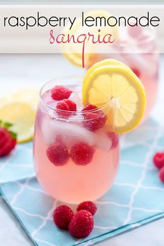 raspberry lemonade sangria in a glass with fresh raspberries