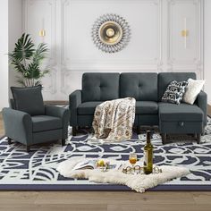 a living room scene with focus on the couch and chair, while the rug is covered in furnishing