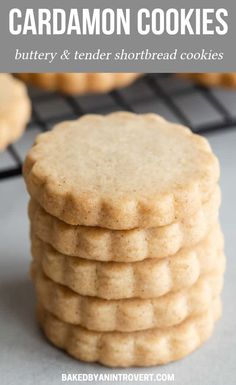 a stack of cookies sitting on top of a cooling rack