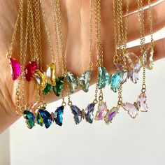 "Crystal Butterfly Necklace, Colorful Glass Minimalist Charm Necklace This gorgeous necklace is even prettier in person. Stunning and meaningful gift to someone special, or even an attractive layering necklace for yourself! These necklaces are high quality and beautifully finished, on hypoallergenic and tarnish-resistant chains (will not turn skin green). Consider adding jewelry boxes for an even better presentation! ♡ J E W E L R Y ∙ D E T A I L S * Chain Material: Gold dipped stainless steel c Crystal Butterfly Charm Necklace, Dainty Butterfly Clavicle Necklace For Parties, Crystal Jewelry With Butterfly Charm, Crystal Butterfly Charm Jewelry, Gold Crystal Butterfly Jewelry, Gold Butterfly-shaped Crystal Jewelry, Gold Butterfly Necklace With Delicate Chain For Party, Gold Butterfly Necklace For Party, Butterfly-shaped Crystal Jewelry Gift