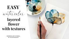 a person is painting flowers with watercolors on paper and the words easy watercolor layered flower with textures