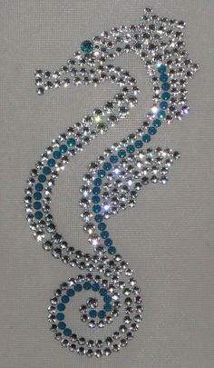 the beaded design is made with blue and silver beads