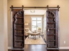 an open door leading into a living room