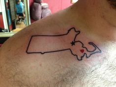 a man with a tattoo on his chest that has the state of new hampshire in it