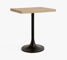 a square table with a black base and a light wood top on an isolated white background