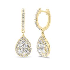 These enchanting dangle earrings feature pear-shaped drops suspended from diamond hoops and set with a cluster of shimmering round diamonds. Classic and chic, they’ll instantly add a touch of elegance to any ensemble. - 18K gold weighing 4.70 grams - 90 round diamonds weighing 1.42 carats - Color - F-G - Clarity - VS2-SI1 Dimensions - 28.6mm (L), 10mm (W) Available in yellow, white, and rose gold. Please allow 4-6 weeks for delivery if item is not in stock. Item no. E300829