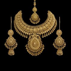 India Necklace India bridal jewelry set South India Jewellery Pakistani Necklace India Choker Temple Necklace and earrings wedding Jewelry This is a Beautiful Gold Plated Necklace India Jewelry Set which you can easily match with your Indian Outfits. Buy this India Wedding Set from AgulkaJewels, and make a unique collection. *PRODUCT DETAIL* *Material: Brass *Plating: 22K Antique Gold Plated *DIMENSIONS * *Necklace:- Weight: 165 gm, Drop Length:- 7.5 Inches, Width: 3.7 Inches. *Earrings:- Weight Gold Jewelry Wedding Bridal Sets, Bridal Necklace Set Gold, Beautiful Gold Necklace Bridal Jewelry, Gold Jewelry Set Design, Pakistani Gold Necklace, Gold Set Designs Jewelry Unique, Antique Gold Jewelry Indian Bridal Jewellery Necklace Set, Gold Jewellery Set Design, Gold Set Bridal