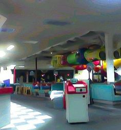 the interior of a children's play area with toys