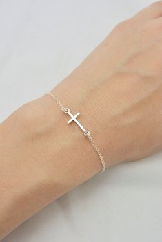 ALL SOLID STERLING SILVER PARTS - A QUALITY BRACELET I make this lovely bracelet using a solid sterling silver cross that measures just under 3/4 inch long. A sturdy sterling silver chain and lobster clasp make this a durable bracelet. Makes a wonderful layering bracelet when paired with my other pieces. Comes in a gift box perfect for gift giving. SIZING - IMPORTANT: To determine bracelet size, measure snugly around your wrist and add 1/2 inch to get your bracelet size. Do NOT order in your exa Bible Verse Jewelry, Silver Cross Bracelet, Tiny Cross, Sweet Jewelry, Faith Jewelry, Random Inspiration, Soul Connection, First Communion Gifts, Cross Bracelet