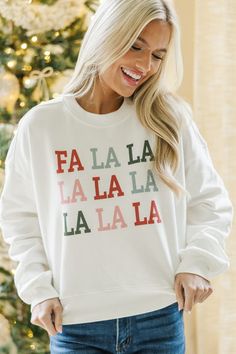 This graphic sweatshirt is so festive and fun! It has it all! All of those colors are so much fun and the saying is perfect for the season. You are going to love style this colorful sweatshirt with your favorite jeans and some cute boots! Crew... Colorful Sweatshirt, Floral Cocktail Dress, Black Tie Dress, Long Sleeve Outerwear, Cute Boots, Cute Rompers, Love Style, Sweater Tank Top, Romper With Skirt