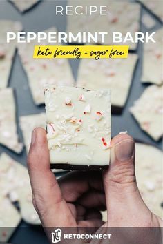 a hand holding up a piece of peppermint bark with the words recipe on it