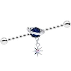 14 Gauge Aurora Blue Gem Saturn Star Dangle Industrial Barbell 38mm This 14 gauge helix barbell will have you seeing stars...and planets! It's made with a 1 1 /2" durable 316L surgical grade stainless steel straight barbell with 5mm ball ends. It features a planet Saturn charm, with the planet set in deep blue gems and a simple ring around it. Dangling beneath it is a small star charm, with an aurora gem set at the center. And you can slide the charm up and down the length of the barbell for the Types Of Ear Piercings, Planet Saturn, Barbell Earrings, Industrial Barbell, Industrial Piercing, Body Jewelry Piercing, Helix Earrings, Ear Candy, Blue Gems