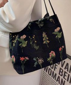 Experience the functionality and style of our New Black Embroidered Large Capacity Canvas Shoulder Bag. With its spacious design and elegant embroidery, this bag is the perfect versatile accessory for any occasion.This bag is made of fine Canvas fabric.Measurement: 28cm/10.92" * 23cm/8.97" * 11cm/4.29"Zip up closure. Inside pockets. Tas Mini, Beg Tangan, Embroidered Shoulder Bag, Hippie Stil, Sacs Design, Flowers Tote, Embroidered Handbag, Embroidered Tote Bag, Tas Fashion