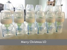 a group of baby bottles sitting on top of a counter