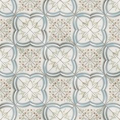 a white and blue wallpaper with an intricate design