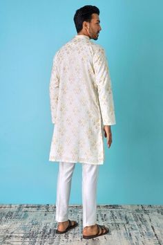 Ivory chanderi jacquard silk kurta with all over multi color leaf print, metallic woven highlights and thread embroidered placket. Paired with contrast pyjama. - Aza Fashions Woven Highlights, Kurta Set Men, Men Kurta, Embroidered Leaves, Silk Kurta, Thread Work, Kurta Set, Full Sleeves, Leaf Print