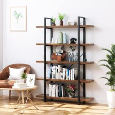 a living room with a book shelf filled with lots of books and plants next to a window