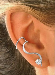 Bling - Bling - Bling... Ear Charms Sophisticated non-pierced "One-liner" Ear Wrap Earring is a Simple "S" Shape Line of White (a Carefree Finish) With A Large 5mm Round (1/2ct.) Brilliant Cubic Zirconia (CZs) at the Bottom. Great Gift for Un-Pierced Moms & Grads! It's Clean, Uncomplicated Style Is The Perfect Compliment To So Many of Your Other Earrings. They Gracefully Wind From Mid-Ear Down to the Lower Lobe Winding In & Out of Your Pierced Earrings. This is One of the Favorites of non-pierce Ear Wrap Earrings, Cuff Earring, Wrap Earrings, Sedona Az, Ear Cuff Earings, One Liner, Large Earrings, Cuff Earrings, Sedona