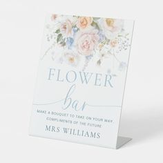 a white card with flowers on it and the words flower bar written in blue ink