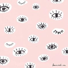 an eye pattern on a pink background