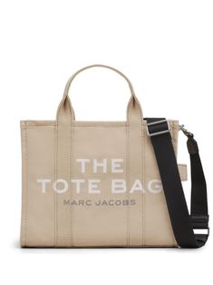 Beige cotton medium The Tote bag from Marc Jacobs featuring logo print to the front, logo patch to the rear, two rounded top handles, adjustable detachable shoulder strap and top zip fastening. This item is in size UNI and the color is Beige The Marc Jacobs Tote Bag, Marc Jacobs Tote Bag, Medium Tote Bag, Marc Jacobs Tote, The Medium, Bags Aesthetic, Denim Gift, Marc Jacobs Bag, The Tote Bag