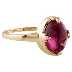 This elegant 14K Yellow Gold Cocktail Ring showcases a stunning 3.10 carat pink tourmaline cabochon, making it a perfect statement piece for any occasion. The smooth, oval-shaped tourmaline is set in a sleek and timeless design that highlights its natural beauty. Ideal for adding a pop of color and sophistication to your jewelry collection. Specifications: * SKU: SXNR-335 * Stock ID: RRING278490 * Metal Type: 14K Yellow Gold * Marks: 14K, Maker's Mark * Total Item Weight: 3.0 grams * Gemstone Details: * Center Stone: * Gemstone: Tourmaline * Carat Weight: 3.10 carats * Stone Count: 1 * Stone Shape: Cabochon, Oval * Stone Color: Pink * Type/Clarity: Slightly Included * Dimensions: * Band Width: 1.7mm * Ornament Length: 11.7mm * Ornament Width: 9.7mm * Ring Size: 7 (adjustable by one whole s Fine Jewelry Ruby Oval Cabochon Ring, Formal Cabochon Ruby Ring, Formal Pink Rings With Polished Finish, Classic Domed Ruby Ring, Classic Tourmaline Jewelry With Polished Finish, Formal Cabochon Domed Ruby Ring, Formal Oval Cabochon Ruby Ring With Polished Finish, Oval Tourmaline Ruby Ring For Formal Occasions, Luxury Tourmaline Jewelry In Oval Cabochon Shape