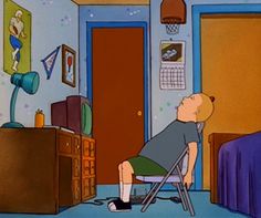 a cartoon man sitting in a chair with his feet on the table and looking at something