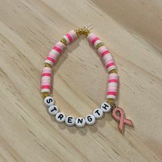 Pink breast cancer ribbon bracelet. Pink Bead Bracelet Ideas, Ribbon Bracelet, Ribbon Bracelets, Diy Bracelet Designs, Clay Bead, Bracelet Ideas, Bead Bracelets, Pink Beads, Diy Bracelet