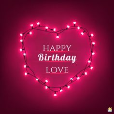 a heart shaped birthday card with the words happy birthday love written on it and lights in the shape of a heart