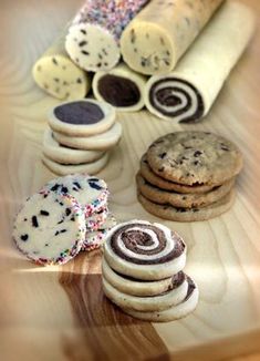 an assortment of cookies and pastries on a table