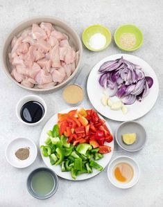 the ingredients for this dish include onions, peppers, and chicken