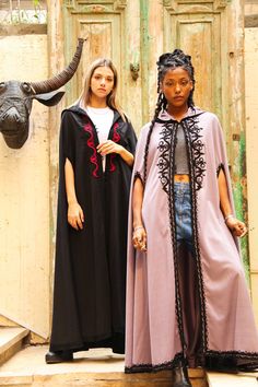 This hand embroidered cape is a bohemian dream. It's extremely classy and practical. Will definitely keep you warm on those winter nights while making you look like an African queen. Material : Wool Length : 49 inches Size : Free size - up to 3 XL We ship your order with DHL express within one to two business days. Orders to Europe will typically arrive within 2 to 3 business days and to USA within 3 to 5 business days from the date of shipping. **Please note that shipping to these locations in Bohemian Hooded Cape For Festivals, Embroidered Cape Outerwear For Fall, One Size Bohemian Cape Outerwear, Bohemian One-size Cape Outerwear, Bohemian Hooded Cape One Size, Oversized Cape Outerwear For Festivals, Black Moroccan, Cape For Women, Embroidered Cape