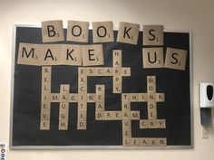 a bulletin board with words that read books make us