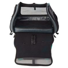 the back side of a backpack with its zipper open and two compartments on each side