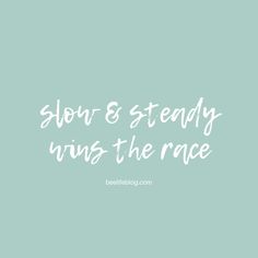 the words slow & steady was the race written in white on a light blue background