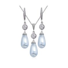 "Swarovski Light Blue Drop Pearl Necklace and Earrings Jewelry Set A beautiful jewelry set perfect for the bride, mother of the bride, mother of the groom, bridesmaids, maid of honor, matron of honor or wedding guests for a black themed wedding.  Also a perfect gift or accessory for prom, birthday or anniversary parties. EARRINGS AND NECKLACE CAN BE PURCHASED SEPARATELY OR AS A SET. Materials: 15mm x 8mm Swarovski Long Drop Pearls.   Rhodium Plated Sterling Silver Necklace Chain Rhodium Plated B Light Blue Pearl Necklace, Blue Prom Jewelry, Black Themed Wedding, Light Blue Prom, Mother Of The Bride Jewelry, Blue Earrings Wedding, Pearl Wedding Jewelry Sets, Pearl Wedding Jewelry, Prom Birthday