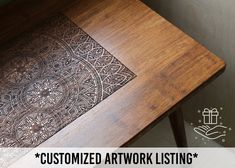 a wooden table with an intricate design on it