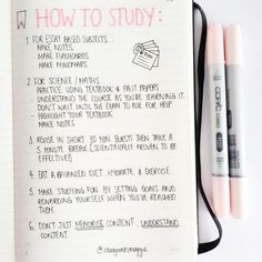 an open notebook with writing on it next to two pens and a clipboard that says how to study