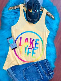 💛 New Lake Life Super Soft Tank 💛 Only $24 S, M, L, XL Runs True To Size 😊 https://rhinestonegal.com/collections/new/products/lake-life-racerback-tank Lake Outfits, Lake Outfit, Tshirt Ideas, Makeup Stain, Lake Life, Racerback Tank, New Products, Maine, Lake