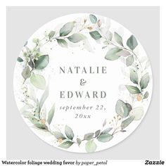 watercolor wedding favors with greenery and leaves on the front, in white paper