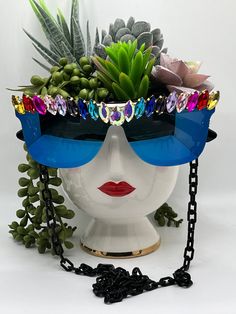 Simple, yet bold and glam. These blue-mirrored aviator sunglasses are embellished with a rainbow of rhinestones and come with a removable black chain. Featuring bold, fashion-forward designs, these glamorous sunglasses are perfect for making an entrance at any special occasion. Embellished and colorful, these fun and inspiring sunglasses will make sure you stand out in a crowd. Ideal for bachelorette parties, Vegas trips, weddings, birthdays, and more - Roaring Sunnies are the perfect accessory Glamorous Sunglasses, She's A Rainbow, Mirrored Aviator Sunglasses, Vegas Trip, Bachelorette Parties, Black Chain, A Rainbow, Bold Fashion, Aviator Sunglasses