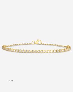 14k solid gold Round, natural diamonds: Color: I-J Clarity: SI Lobster clasp closure Half coverage: 30 round, natural diamonds Total carat weight: approximately 0.51 Diamond coverage: 3.25 inches Length: 5.5-7 inches, adjustable Width: 2.5 mm Eternity coverage: 52 round, natural diamonds Total carat weight: approximately 0.89 Diamond coverage: 5.5 inches Length: 6-7 inches, adjustable Width: 2.5 mm Classic Gold Bracelet With Brilliant Cut, Round Diamond White Bracelet For Everyday Luxury, Diamond Bracelet With Prong Setting, Fine Jewelry Diamond Bracelet With Round Cut Accents, Classic Yellow Gold Tennis Bracelet With Single Cut Diamonds, Fine Jewelry Gold Diamond Bracelet Vvs Clarity, Timeless Diamond Bracelet With Prong Setting, Diamond White Brilliant Cut Gold Bracelet For Anniversary, Diamond White Gold Bracelet With Brilliant Cut For Anniversary