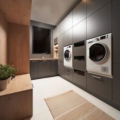 a washer and dryer in a modern laundry room